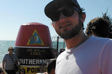 Profile picture of Andrew standing at the Southern-most point in the United States.